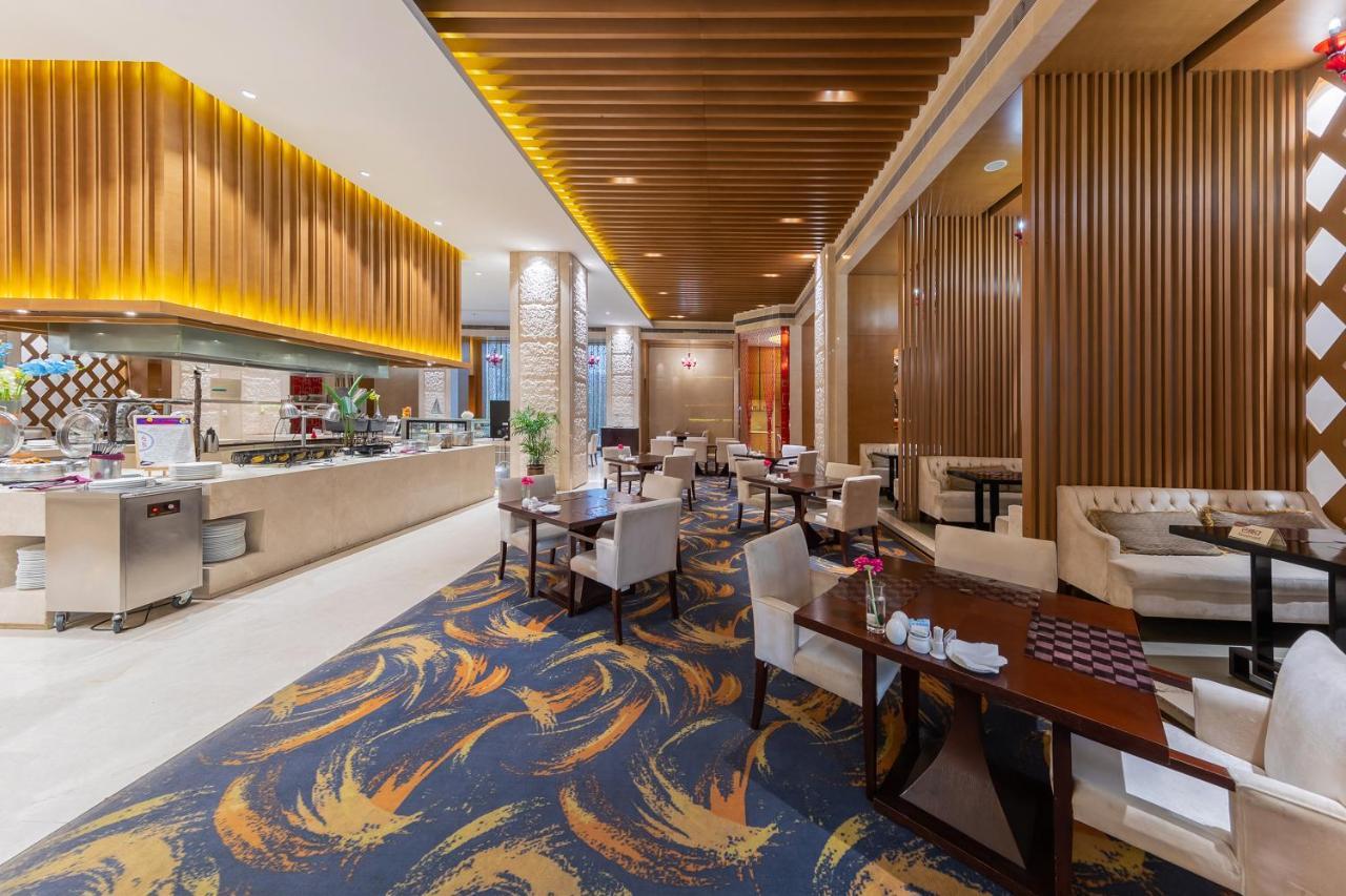 Movenpick Hotel Enshi Buitenkant foto